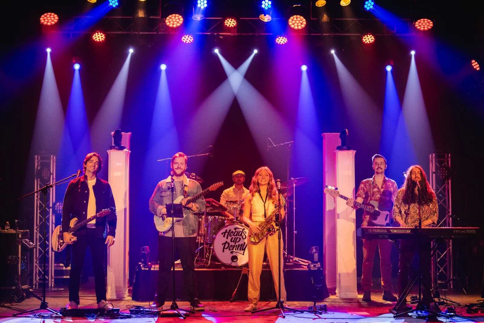 Heads Up Penny performing together on stage