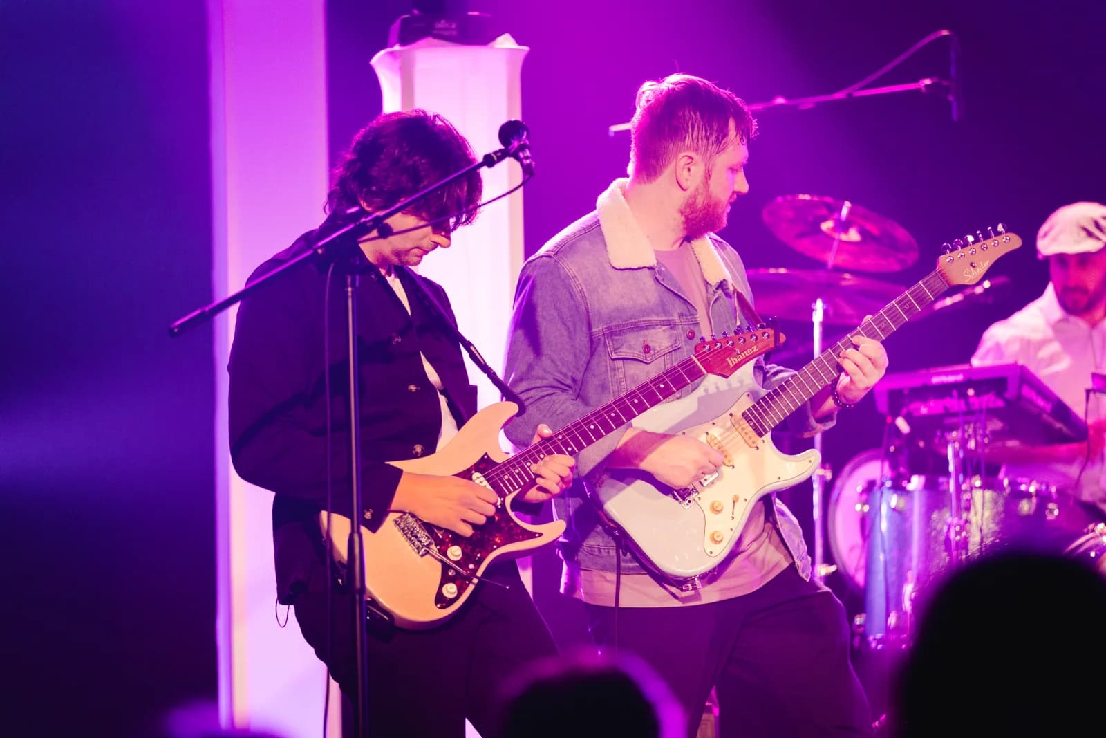 HUP bandmates playing together on stage