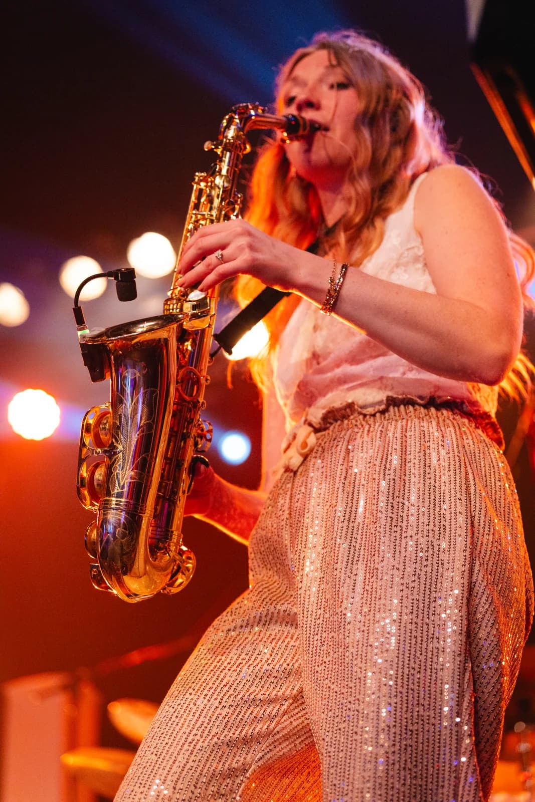 Jenn playing saxophone live